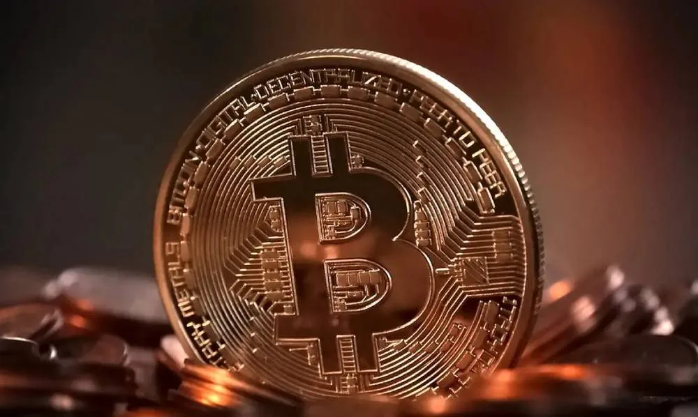 Bitcoin se aproxima de US$ 82 mil com redução das expectativas de alta dos juros nos EUA